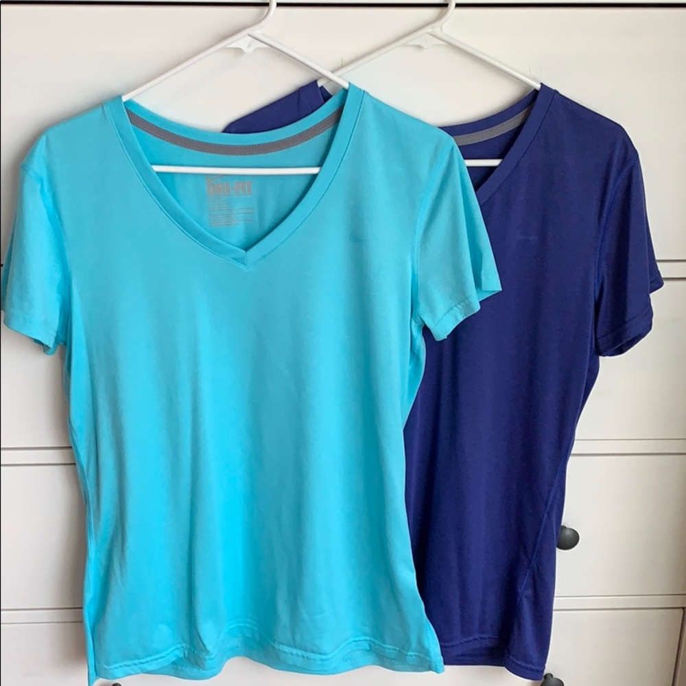 2 women’s Large Dri Fit tees